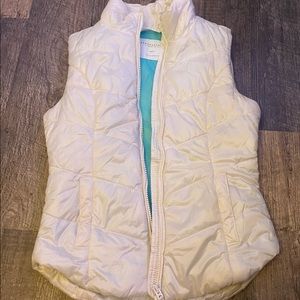 white zip up vest